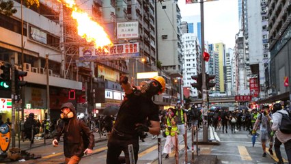 Hong Kong protesters defy anti-mask law with weekend marches