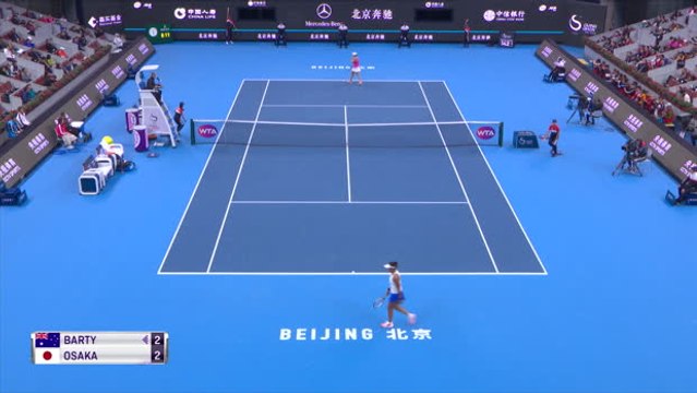 Osaka fights back against Barty to win second straight title