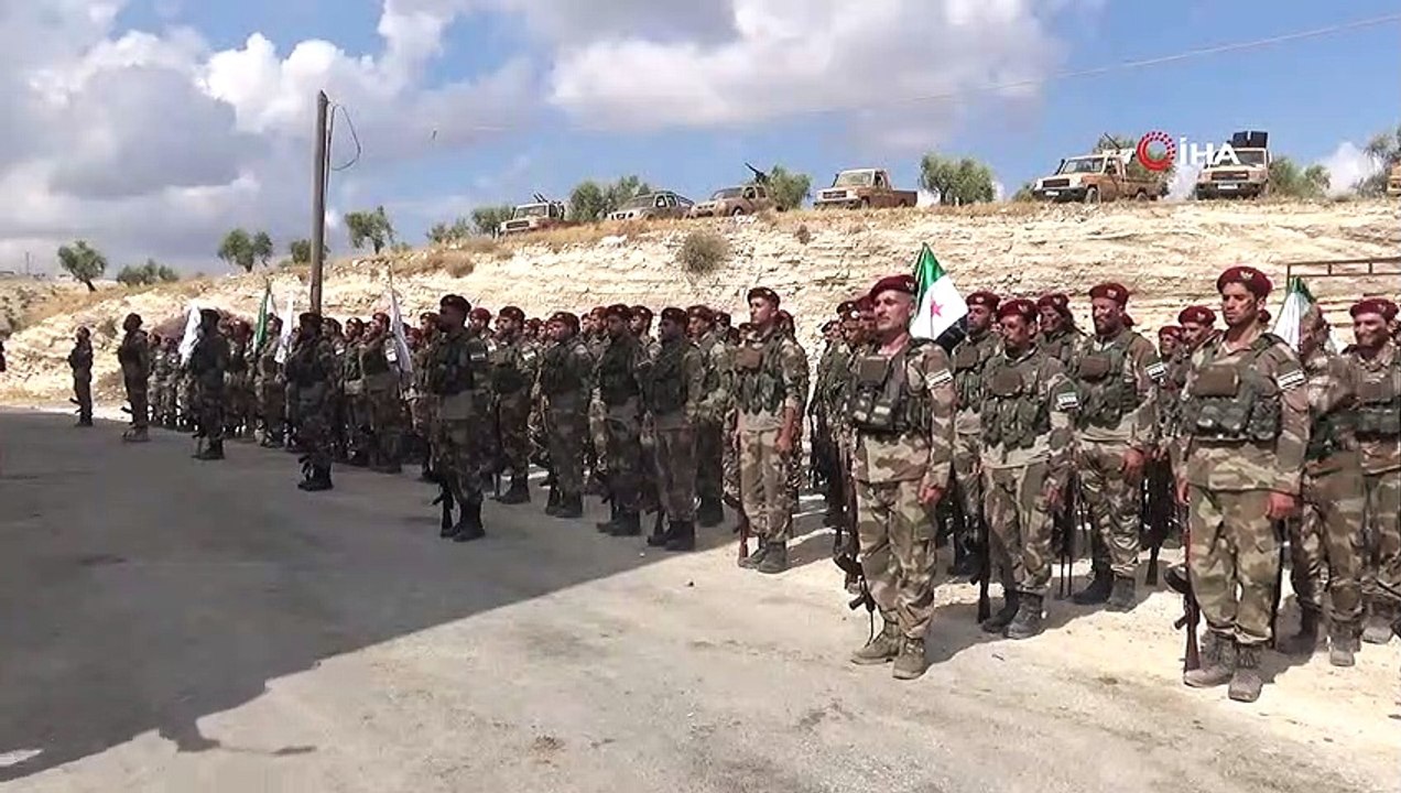 - Suriye Geçici Hükümetine bağlı Suriye Milli Ordusu'ndan PYD-PKK'ya gözdağı- Yaklaşık 400 özel birliğin katıldığı tatbikatta senaryo gereği PYD/PKK'lı hedefler imha edilerek Suriye Geçici Hükümetine bağlı Suriye Milli Ordusu bayraklar..