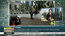 China: reportan a los dos primeros imputados por portar máscaras
