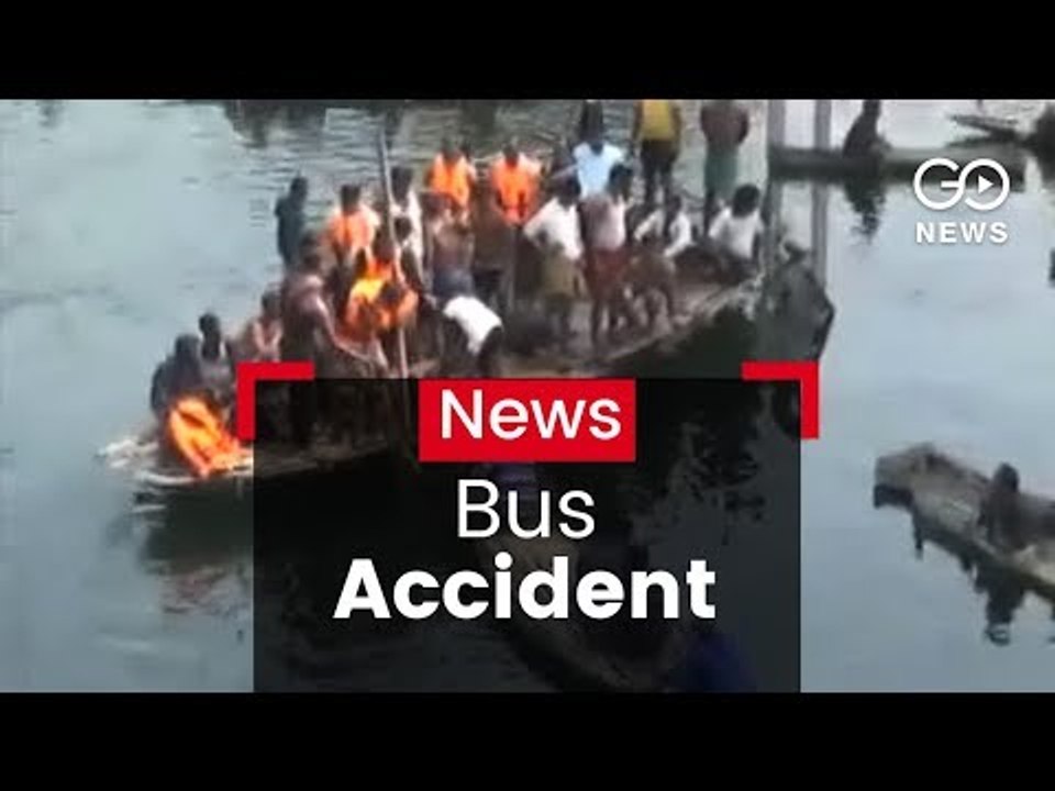 Bus Plunges Into River