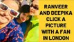 Ranveer Singh and Deepika Padukone click a picture with a fan in London | SpotboyE