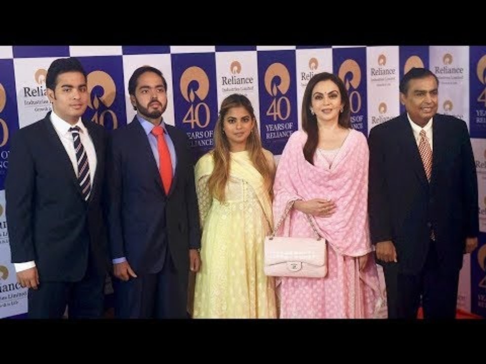 Mukesh-Nita Ambani with Akash Ambani and Shloka Mehta attend Reliance AGM | SpotboyE