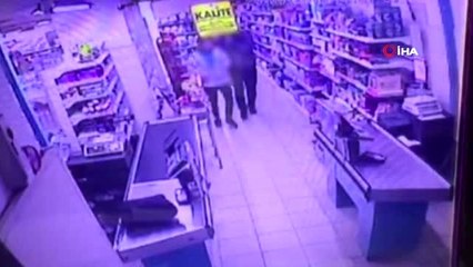 Ümraniye'de silahlı market soygunu kamerada