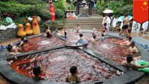 Chinese tourists flock to hot pot style hot spring in Chongqing