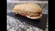 Grilled tomato with mozzarella and sautéed onion baguette