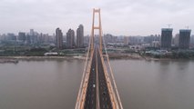 World’s longest double-deck suspension bridge opens in China