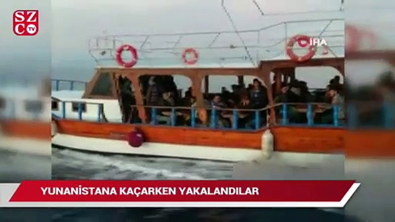 Tur teknesine turist gibi bindiler, Yunanistan'a kaçarken yakalandılar