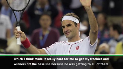 Federer tested by Goffin