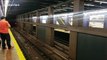 Buskers duet Bach piece from opposite sides of subway tracks in New York City