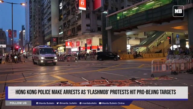 Hong Kong police make arrests as 'flashmob' protests hit pro-Bejing targets