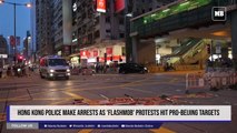 Hong Kong police make arrests as 'flashmob' protests hit pro-Beijing targets