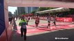 Marathon runners push through to the end