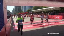 Marathon runners push through to the end