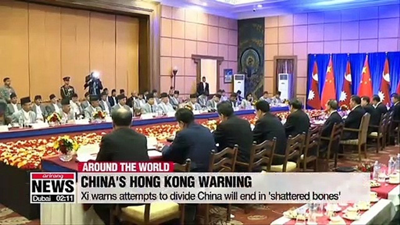 Xi warns attempts to divide China will end in 'shattered bones'