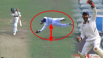 Brilliant Catch By Wriddiman Saha gets  kissed by Virat Kohli