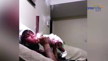 Shocking Video : Cruel mum Throws Baby  with one hand while smoking