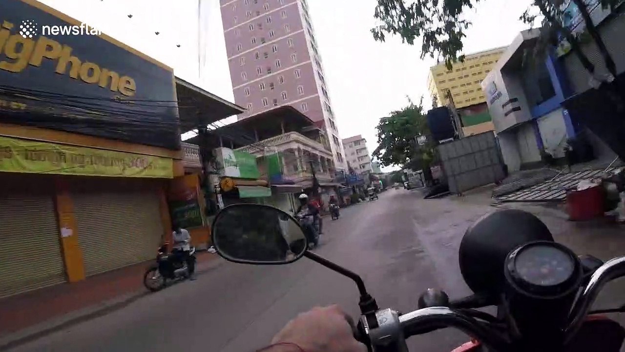 British biker hurled to the ground after motorcycle thieves tried to grab his girlfriend's gold chain