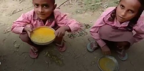UP School Kids Eat Unusual Midday Meal: Rice and Turmeric Water 🍚