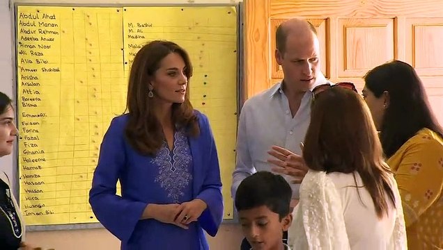 Duke and Duchess of Cambridge speak with pupils in Islamabad