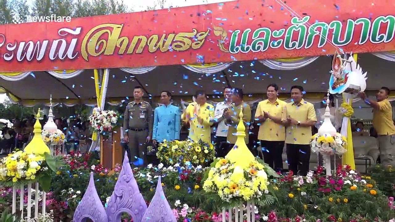 Colourful parades to mark the end of Buddhist lent in Thailand
