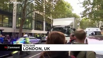 Extinction Rebellion co-founder arrested after smashing ministry window
