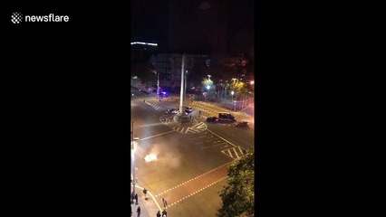 Demonstrators nearly run over by Barcelona police vans during clashes