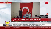 Viranşehirli çocuklar yolda asılı bayrakları alıp evlerine astı