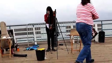 Santa Monica Pier street performer singing