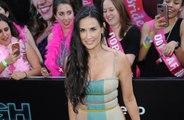 Demi Moore celebrates losses