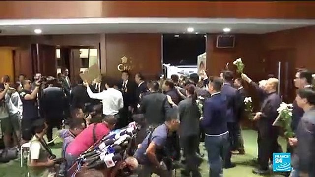 Hong Kong lawmakers dragged from chamber as Carrie Lam is heckled onceagain