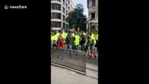 General strike begins as workers march through the centre of Barcelona