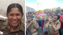 Woman police officer lends a shoulder to her colleague’s last journey