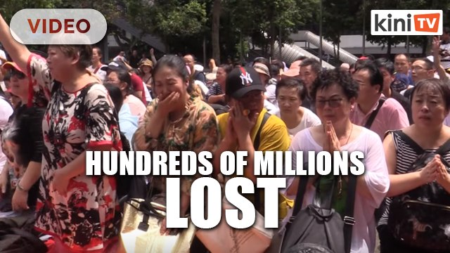 Chinese nationals gather outside embassy in KL after losing millions