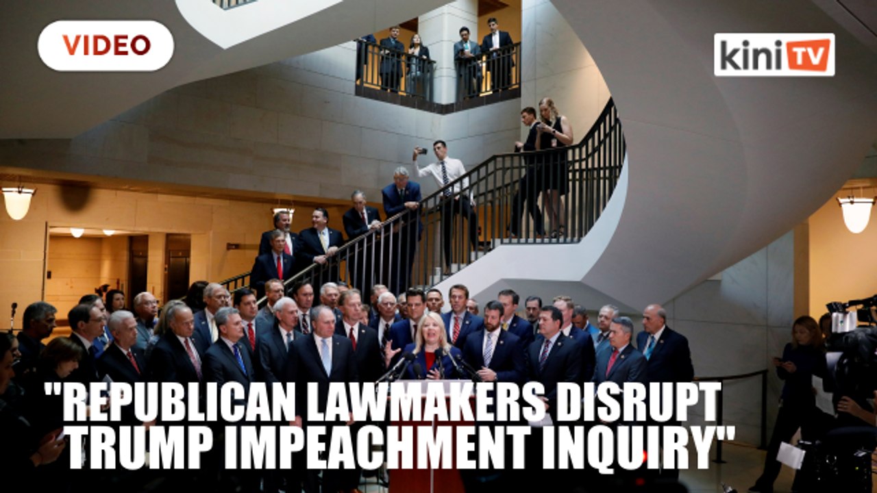 Republican lawmakers storm hearing room, disrupt Trump impeachment inquiry