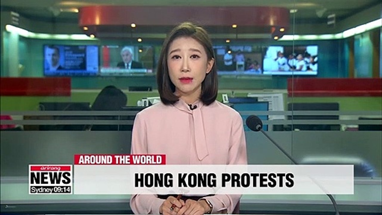 Protesters in Hong Kong hold unauthorized march...