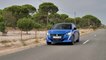 The new Peugeot e-208 GT in Vertigo Blue Driving Video