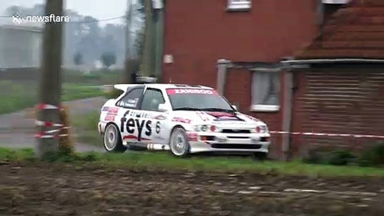 Rally car smashes into utility pole during race in Belgium