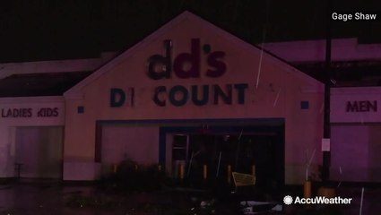 Tornado trashes storefronts and leaves dents in vehicles