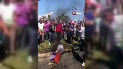 - Lübnanlı göstericiler İsrail bayrağını yaktı