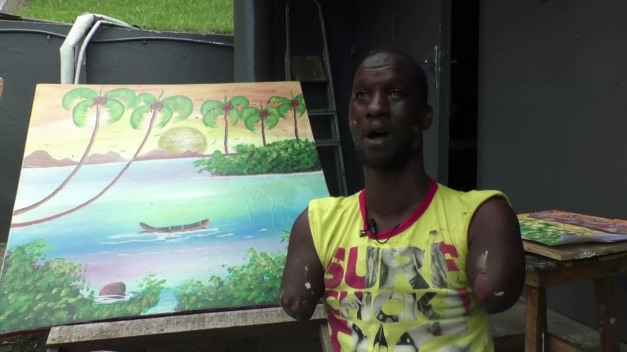Ivorian painter with no arms or legs inspires many