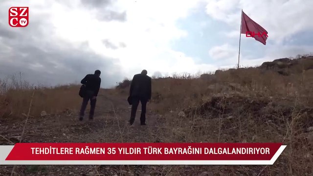 Tehditlere rağmen 35 yıldır Türk bayrağını dalgalandırıyor