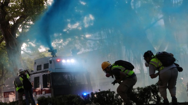 Hong Kong police face questions over targeting journalists during weekend protests