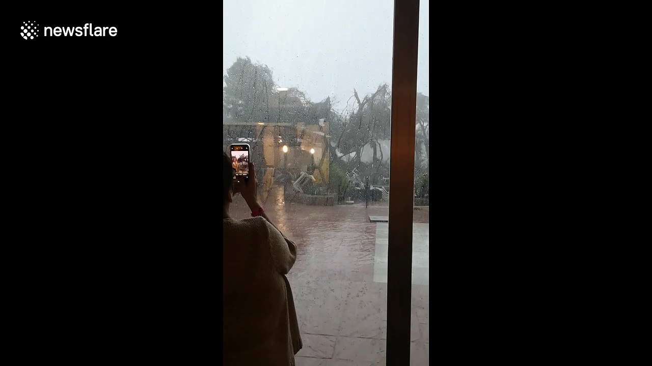UK holiday goers stuck inside hotel watch in shock as tornado strikes Ibiza