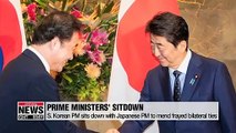 S. Korean PM sits down with Japanese PM to mend frayed bilateral ties