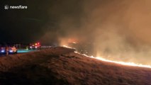 US Firefighters battle against the Kincade Fire in Sonoma Wine Country