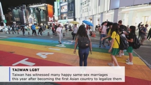 Taiwan's new gay marriages forge new path in Asia