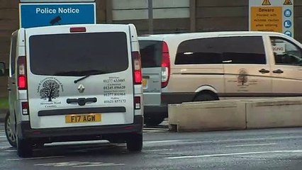 Ambulances move bodies of people found dead in lorry