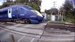 Shocking footage shows biker trying to skip through level crossing – as speeding train was approaching