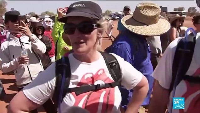 Tourists flock to climb Australia's Uluru rock before ban comes into effect